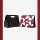 A set of (10) high-end paper bags in the shape of a suitcase
