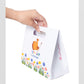 A set of (10) high-end paper bags in the shape of a suitcase