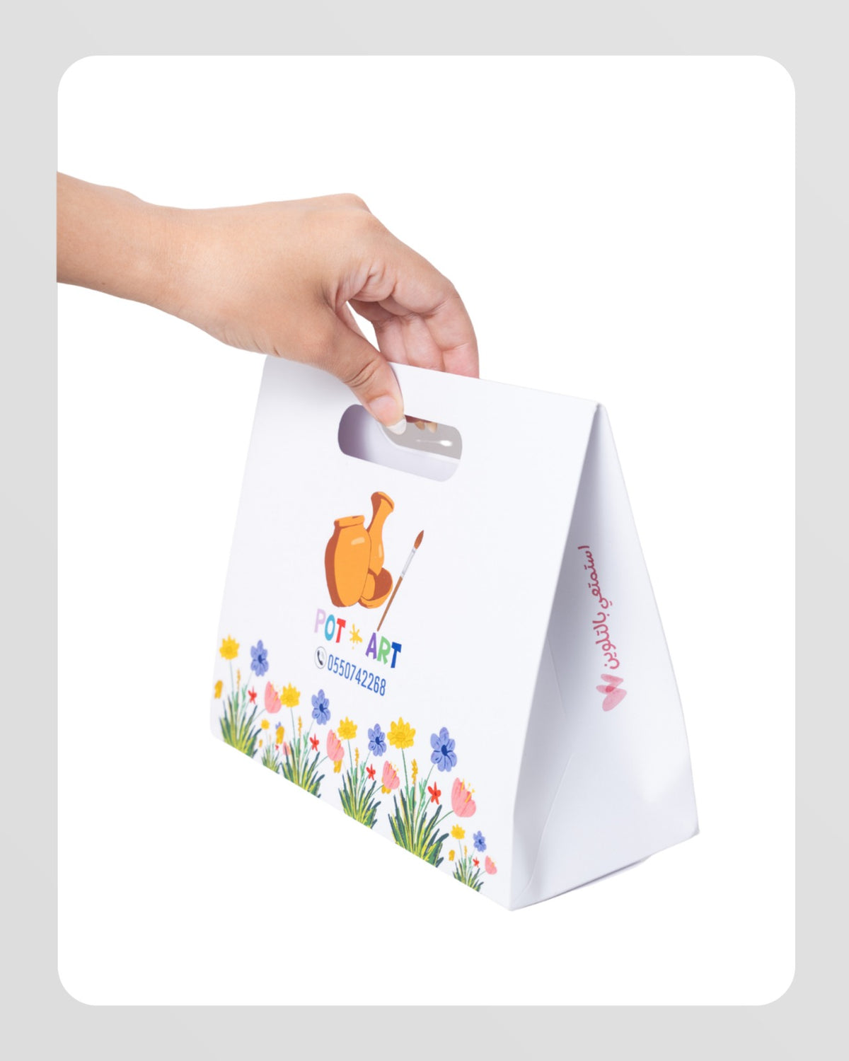 A set of (10) high-end paper bags in the shape of a suitcase